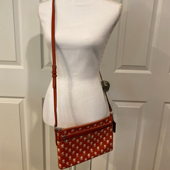 Coach cutie for sure! Great crossbody in bandlands floral. - Picture 1 of 10